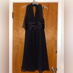 Black dress that ties around the neck, shin length